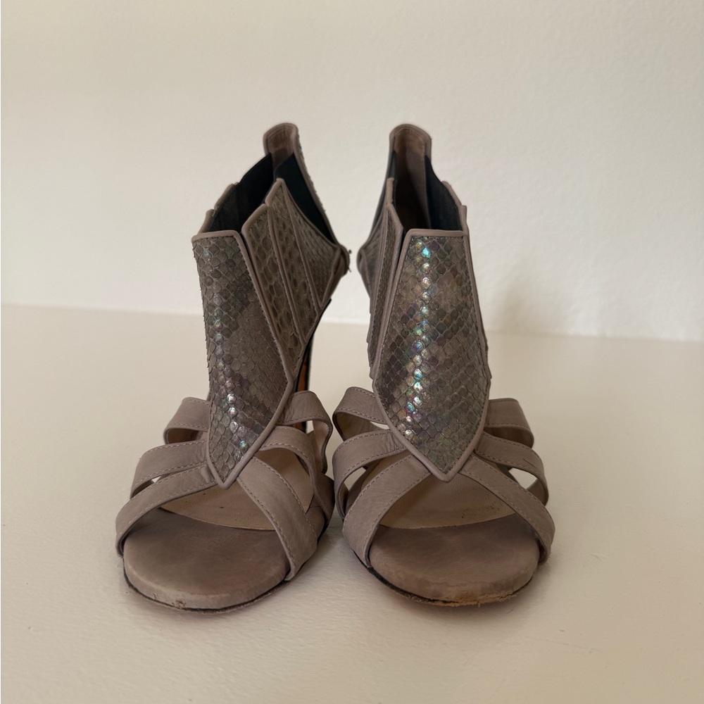 Snakeskin and leather heeled sandals. Great condition.